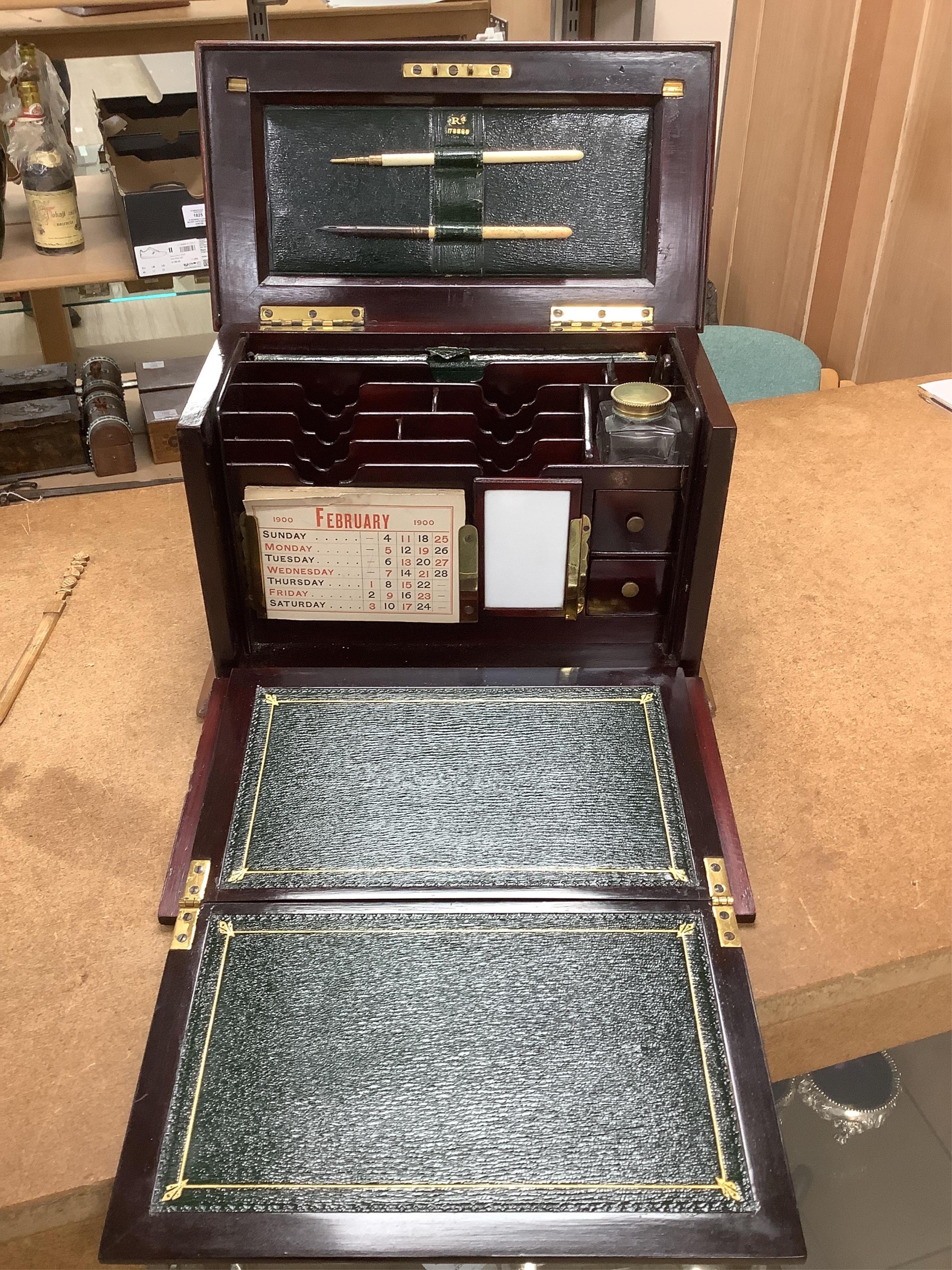 An Edwardian inlaid mahogany writing casket with fitted interior and a late Victorian faded walnut cigar box, largest 32cm wide